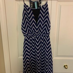 Women’s S high-neck chevron dress with lace panel.